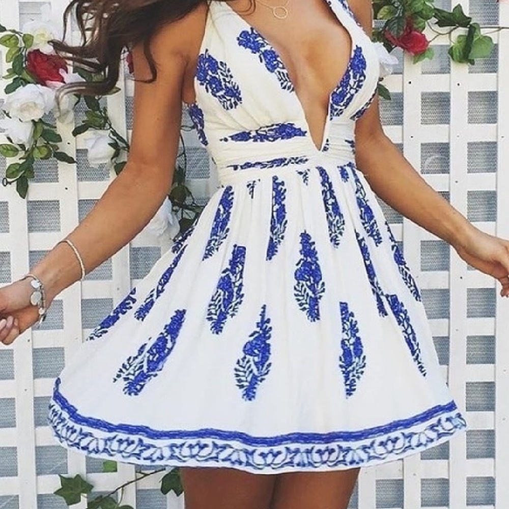 White and blue deep v print dress